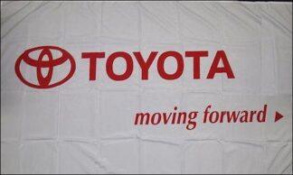 Red Toyota banner with logo and slogan "moving forward" at El Cheapo Flag Store.
